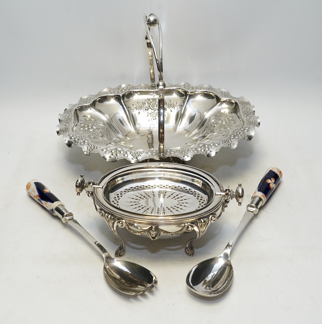 A silver plated breakfast butter dish, an EPNS basket and a pair of salad servers. Condition - good